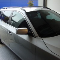 Zilveren BMW 5Serie Touring met geblindeerde ramen
