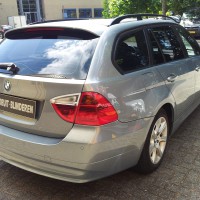 Zilveren BMW 3Serie Touring met geblindeerde ramen