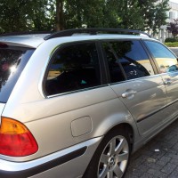 Zilveren BMW 3Serie Touring met geblindeerde ramen